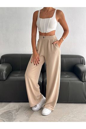 شلوار پارچه ای بژ زنانه کش دار BYKUZEYARAS - کد 889006111