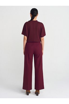 شلوار زرشکی زنانه الاستین Dilvin - کد 889729921