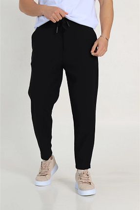 شلوار پارچه ای مشکی مردانه کمر کشی جوگر HOMAN WEAR - کد 889295319
