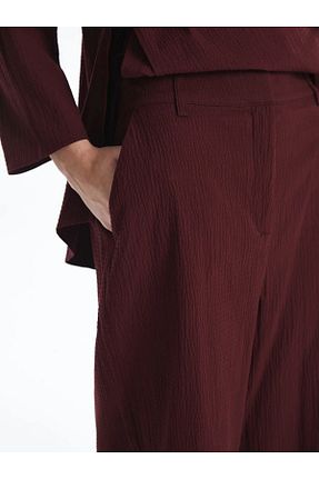 شلوار زرشکی زنانه کش دار LC Waikiki - کد 891042027
