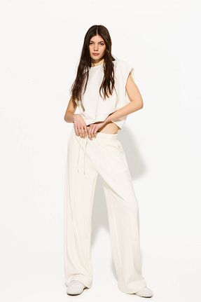 شلوار بژ زنانه پارچه Bershka - کد 891540046
