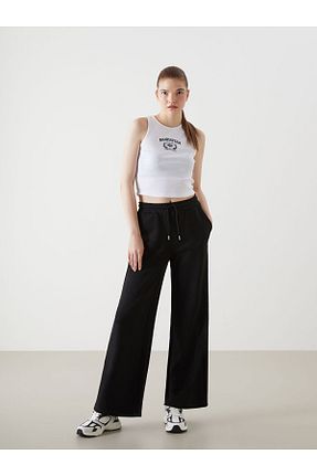 شلوار کرمگن مشکی زنانه پاچه گشاد LC Waikiki - کد 904782318