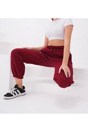 شلوار کرمگن زرشکی زنانه اسلیم UYN SPORT - کد 896022683