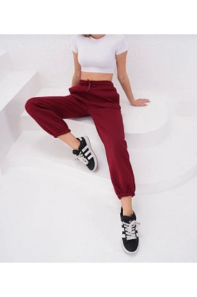 شلوار کرمگن زرشکی زنانه اسلیم UYN SPORT - کد 896022683