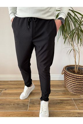 شلوار مشکی مردانه پلی استر HOMAN WEAR - کد 898877864