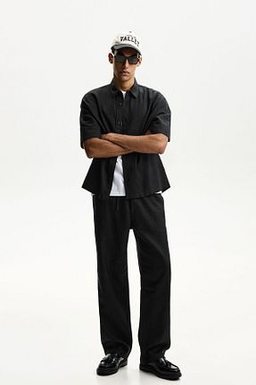 شلوار مشکی مردانه کتان Bershka - کد 898569316