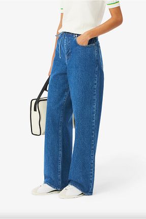 شلوار جین آبی زنانه پاچه گشاد Lacoste - کد 899586895