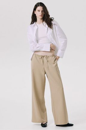 شلوار بژ زنانه پاچه گشاد H&M - کد 900236159