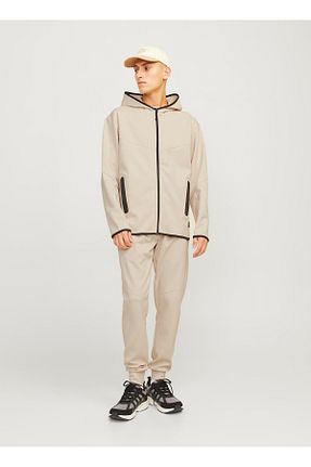 شلوار بژ مردانه پاچه کش دار Jack & Jones - کد 901280964