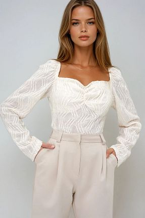 بلوز بژ زنانه طرح دار VAGGON - کد 902119830
