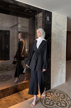ست بالاتنه و پائین تنه مشکی زنانه بافتنی QUQA - کد 902148563