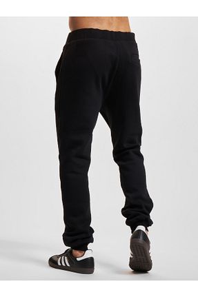 شلوار کرمگن مشکی زنانه رگولار WEARTEX - کد 902930615