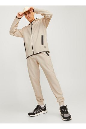 شلوار بژ مردانه پاچه کش دار Jack & Jones - کد 901280964