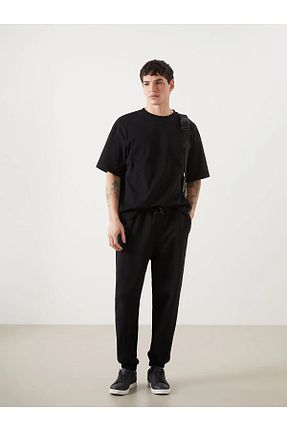 شلوار کرمگن مشکی مردانه Relaxed LC Waikiki - کد 903307871