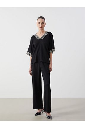 شلوار مشکی زنانه الاستین LC Waikiki - کد 904829405