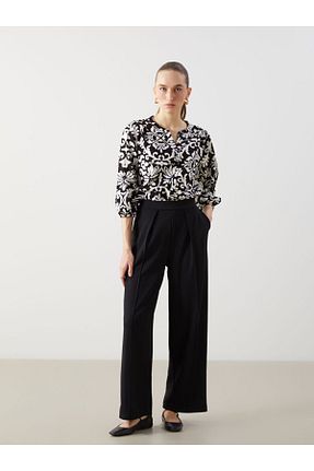 شلوار سبز زنانه الاستین LC Waikiki - کد 905861276