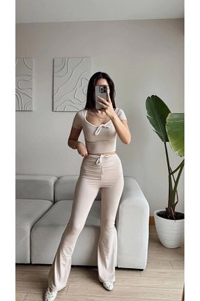 ست بالاتنه و پائین تنه رنگی زنانه بافتنی Zoom Butik - کد 917698619