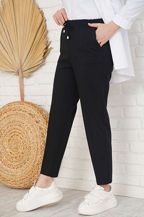شلوار پارچه ای مشکی زنانه پاچه تنگ Tienda Elegante - کد 906432476