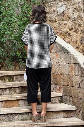 ست بالاتنه و پائین تنه مشکی زنانه بافتنی Nevin Kaya Moda - کد 815775127