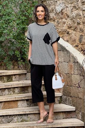 ست بالاتنه و پائین تنه مشکی زنانه بافتنی Nevin Kaya Moda - کد 815775127