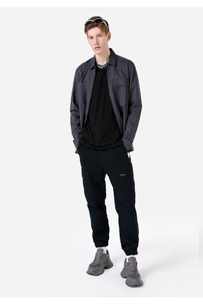 شلوار جین مشکی مردانه پاچه کش دار Colin’s - کد 825530295