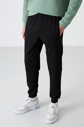 شلوار کرمگن مشکی مردانه پاچه لوله تفنگی TOMMY LIFE - کد 6047087