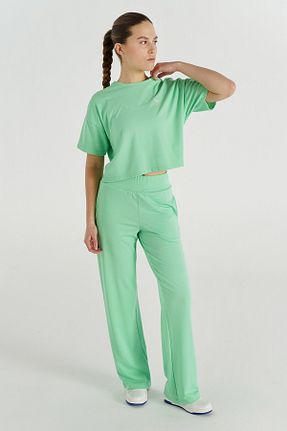پائین تنه گرمکن اسپرت مشکی زنانه پاچه لوله تفنگی hummel - کد 930251426