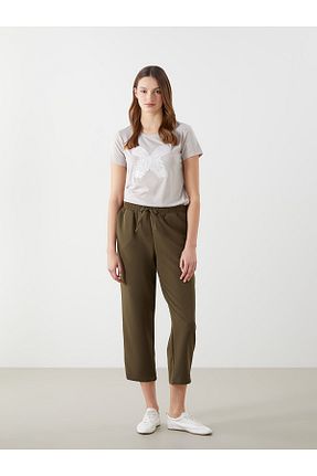 شلوار پارچه ای متالیک زنانه فاق نرمال LC Waikiki - کد 924503660