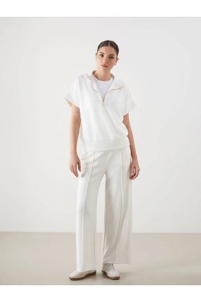 شلوار کرمگن نباتی زنانه پاچه کش دار LC Waikiki - کد 926071164