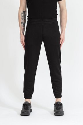 شلوار کرمگن مشکی مردانه پاچه تنگ Emporio Armani - کد 152704478