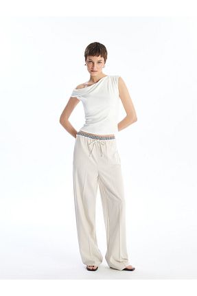 شلوار بژ زنانه فاق نرمال LC Waikiki - کد 930347228
