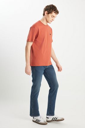 شلوار جین آبی مردانه پاچه تنگ Wrangler - کد 931218426