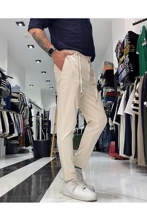 شلوار پارچه ای بژ مردانه بلند Higo Man - کد 931266857