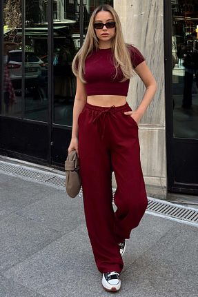 شلوار زرشکی زنانه بافتنی Swist - کد 932574472