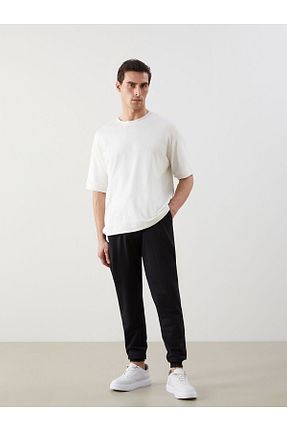 شلوار کرمگن مشکی مردانه پنبه ای LC Waikiki - کد 941033277