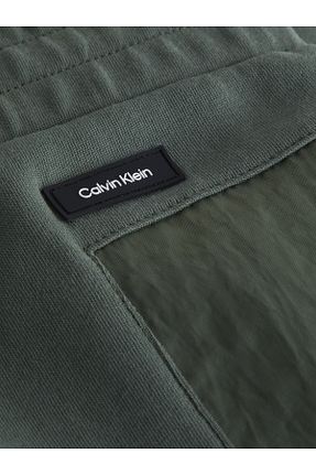 شلوار کرمگن بنفش مردانه پاچه تنگ Calvin Klein - کد 797132200