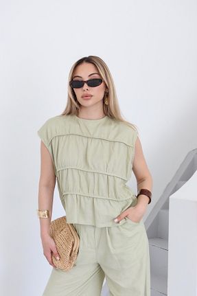 ست بالاتنه و پائین تنه فیروزه ای زنانه بافتنی Laluvia - کد 933208808