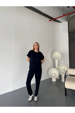 ست بالاتنه و پائین تنه سرمه ای زنانه بافتنی Cappmoda - کد 933347599
