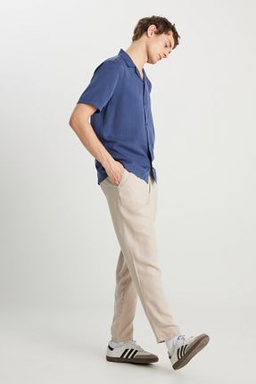 شلوار قهوه ای مردانه تریکو Wrangler - کد 933365928