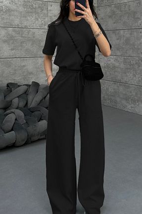 ست بالاتنه و پائین تنه مشکی زنانه بافتنی ruNadeS - کد 934286775