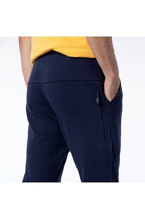 شلوار کرمگن سرمه ای مردانه پاچه کش دار New Balance - کد 372045445