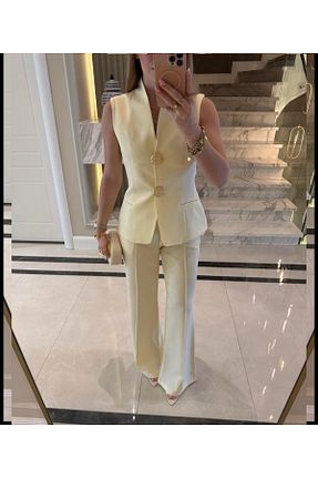 ست بالاتنه و پائین تنه زرد زنانه بافتنی Zirve Moda - کد 937503034