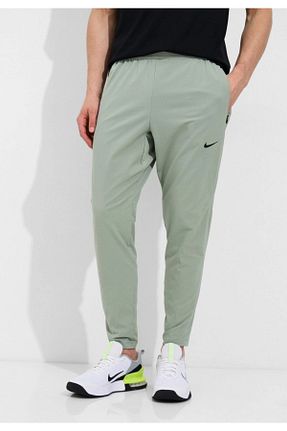 پائین تنه گرمکن اسپرت سبز مردانه رگولار Nike - کد 940084424