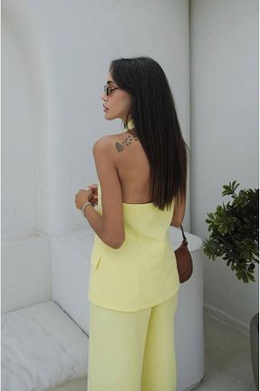 ست بالاتنه و پائین تنه زرد زنانه بافتنی Castivo Fashion - کد 940470860