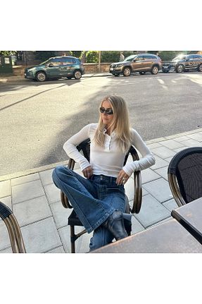 شلوار جین آبی زنانه پاچه اسپانیولی VibeGaia - کد 894133147