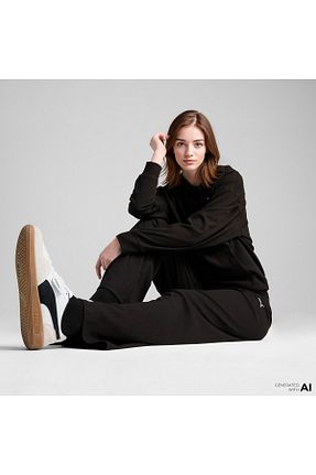 شلوار کرمگن مشکی زنانه پاچه لوله تفنگی Puma - کد 919900996