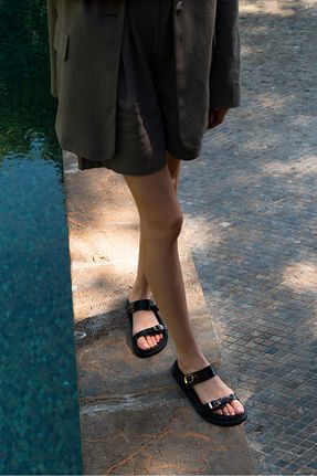 دمپائی مشکی زنانه چرم مصنوعی NİŞANTAŞI SHOES - کد 935389041