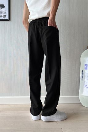 شلوار مشکی مردانه پارچه Flaw Wear - کد 854598518