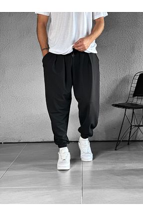 شلوار کرمگن مشکی مردانه پاچه کش دار COCOPELLI - کد 871918299