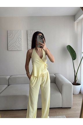 ست بالاتنه و پائین تنه زرد زنانه بافتنی Zoom Butik - کد 943915774